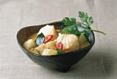 Thailändisch kochen, Gelbes Fisch-Curry mit Wachskürbis und Chili