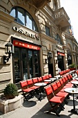 Tables and chairs arranged outside Oscar's Bar and Cafe, Germany