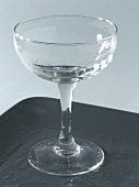Close-up of cocktail glass on wooden surface