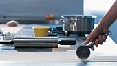 Dough being cut with pastry wheel for ravioli and lasagne