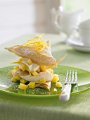Mille-feuille with mascarpone cream and pineapple on plate