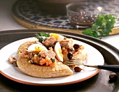 Close-up of sauertiegbrot with lettuce, egg, tuna and olives on plate