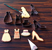 Various cookie cutter and cookies with decoration, glaze and brush