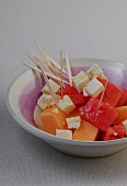Watermelon feta with toothpicks in bowl