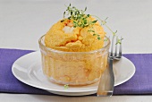 Bowl of lobster souffle with thyme in serving dish