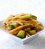 Hot and sour cucumber with bamboo shoots and soy sauce in serving dish