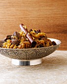 Fried kashmiri lamb with spicy rice and raisins (India)