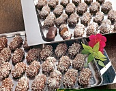 Close-up of chocolates in two silver tray