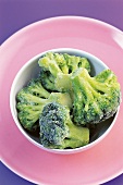 Close-up of frozen broccoli florets in bowl