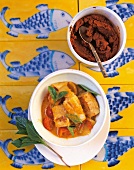 Wok, Fisch-Curry mit Thai- Basilikum und Cocktailtomaten
