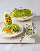 Close-up of stuffed savoy cabbage with carrots, ginger and shallots on dish