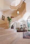 View of marble staircase and photo frame at Hotel Castellino in Italy
