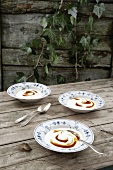 Three dishes of sea buckthorn with quark