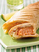 Close-up of puff pastry filled with salmon on plate