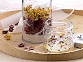 Flowers and sugar in glass jar