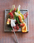 Tuna carpaccio on tempura vegetables