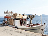 Fishing boat moored at harbour in Eastern Magnesia, Greece
