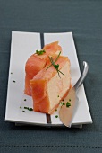 Salmon terrine with chives on plate