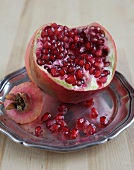 Close-up of pomegranate seeds on plate