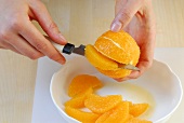 Wok, Orangen-Kokos-Sauce: Orangenfilets herausschneiden, Step3