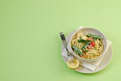 Beans linguine with wild garlic sauce in bowl