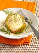 Eggs in wine jelly with carrots, beans and dill on plate
