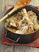 Chicken with black and white sauce and morels in casserole