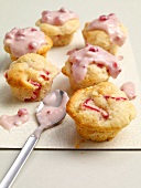Six ricotta muffins with rhubarb sauce and spoon