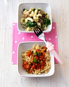 Two bowls of pasta with mince and vegetable stew with couscous