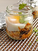 Asian boiled eggs with mushrooms and coriander in glass jar