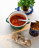 Tomato sauce with chick peas and oyster mushrooms in casserole