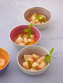 Fours peach dessert with verbena in bowl
