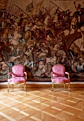 Two purple chairs in front of Tapestry wall in St. Emmeram's Abbey, Regensburg, Germany
