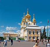People at The chapel of Peterhof Palace with golden domes in Saint Petersburg, Russia