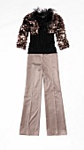 Bolero jacket, sleeveless top and pants with creases on white background