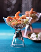 Chilly prawns with coriander yogurt in glass bowl