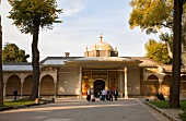 Facade of Topkapi Palace and Gate of Felicity with people, Istanbul, Turkey