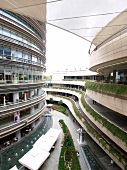 People at futuristic architectured Kanyon shopping mall in Istanbul, Turkey