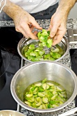 Brussels sprouts being cleaned in water