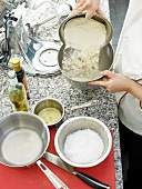 Flour being added in bowl