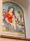 Iconic image of Sancta Maria Maggiore on wall in Bettona, Italy