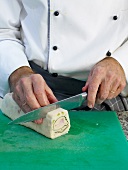 Slicing baked quail fillets