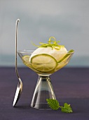 Close-up of elderflower mousse with lime in glass