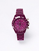 Close-up of purple watch on white background