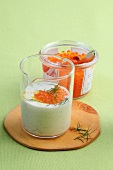 Dip garnished with caviar in glass jar
