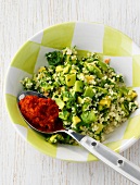 Herb-nut couscous in bowl
