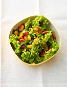 Tutti-frutti salad in bowl, overhead view