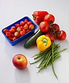 Different fruits and vegetables on white background