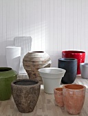 Various colourful planters in different shapes