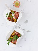 Potato and pepper salad with ham and rocket (seen from above)